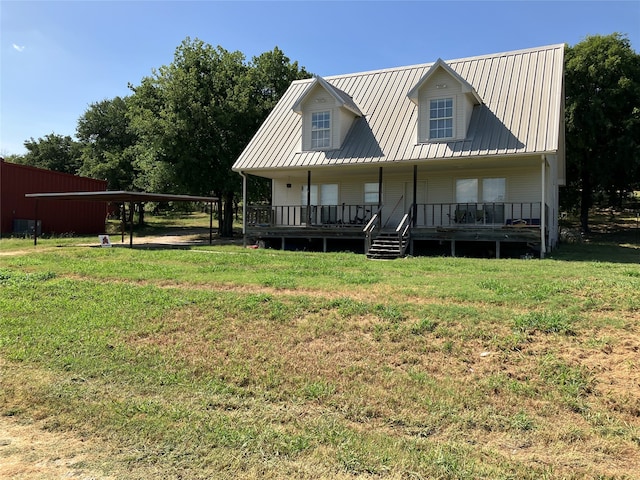 rear view of house with a lawn