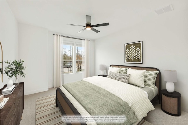 carpeted bedroom with ceiling fan