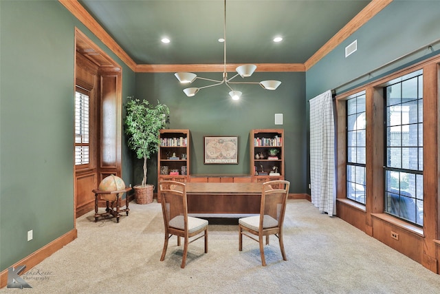 interior space featuring light carpet, ornamental molding, and an inviting chandelier