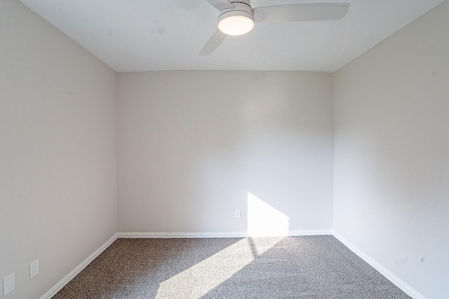 empty room with carpet floors and ceiling fan