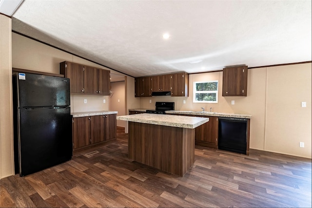 kitchen with dark brown cabinets, dark wood-type flooring, lofted ceiling, and black appliances