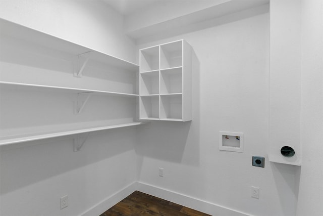 clothes washing area featuring washer hookup, dark hardwood / wood-style floors, and hookup for an electric dryer