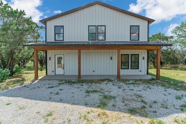 rear view of house with a patio