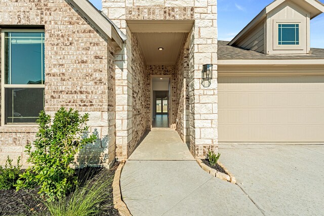 property entrance with a garage