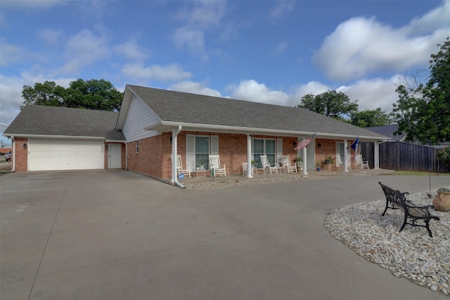 ranch-style home featuring a garage