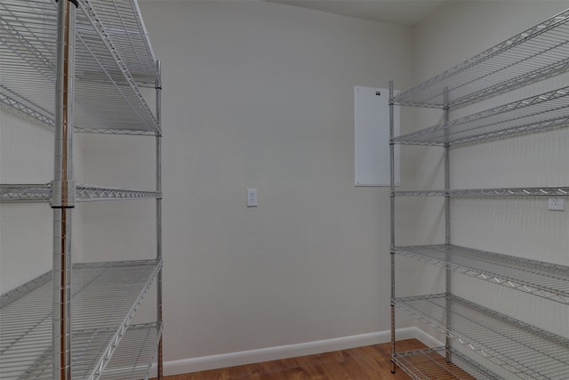 spacious closet featuring hardwood / wood-style flooring