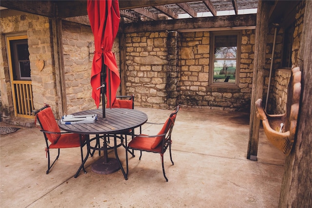 view of patio featuring a pergola