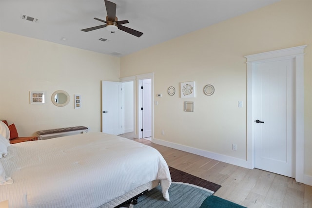 bedroom featuring light hardwood / wood-style floors and ceiling fan