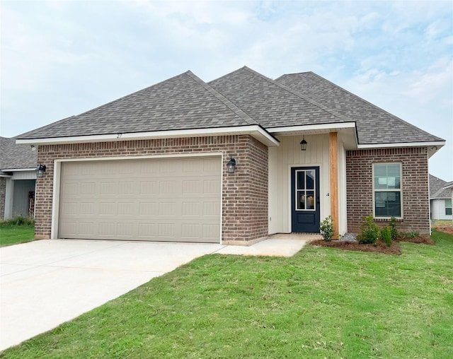 view of front of property featuring an attached garage, brick siding, a front lawn, roof with shingles, and driveway