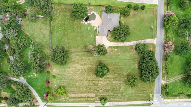 birds eye view of property featuring a rural view