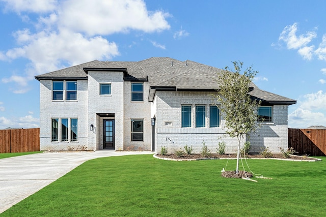 view of front of home featuring a front lawn