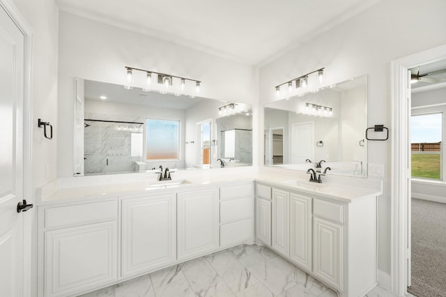 bathroom with vanity and a shower with shower door