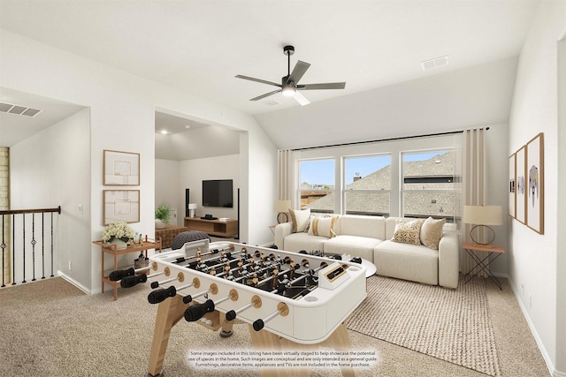 playroom featuring baseboards, ceiling fan, vaulted ceiling, and visible vents