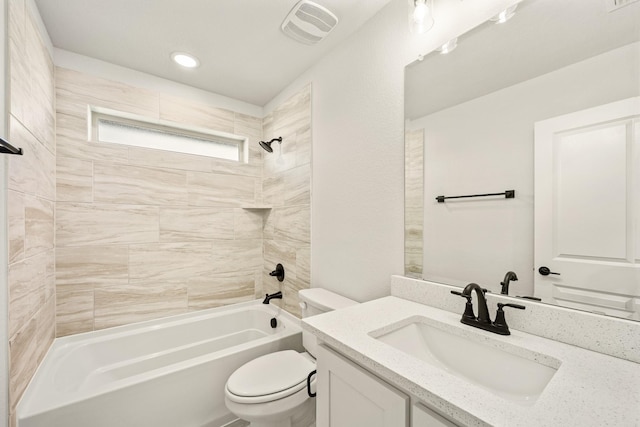 full bathroom featuring vanity, toilet, visible vents, and bathtub / shower combination