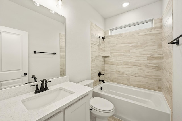 full bathroom with shower / bath combination, vanity, and toilet
