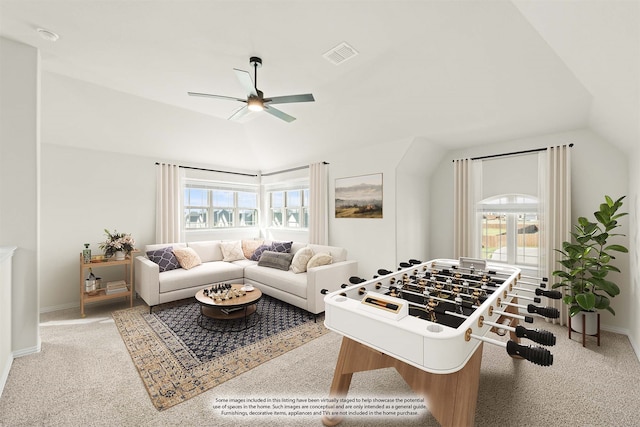 carpeted empty room featuring lofted ceiling and ceiling fan