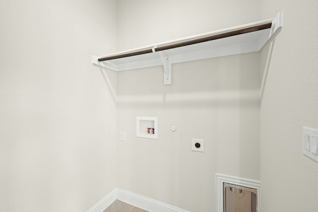 laundry room featuring washer hookup, tile patterned floors, hookup for a gas dryer, and hookup for an electric dryer