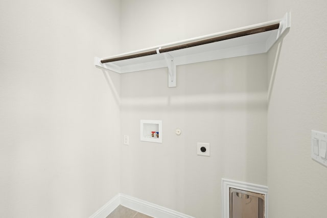 laundry room featuring laundry area, hookup for a washing machine, hookup for a gas dryer, baseboards, and hookup for an electric dryer