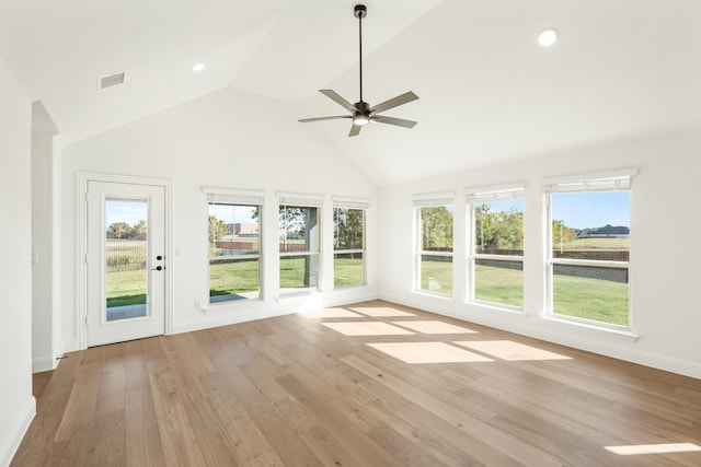 unfurnished sunroom featuring ceiling fan and lofted ceiling