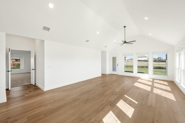 unfurnished living room with light hardwood / wood-style flooring, ceiling fan, and lofted ceiling