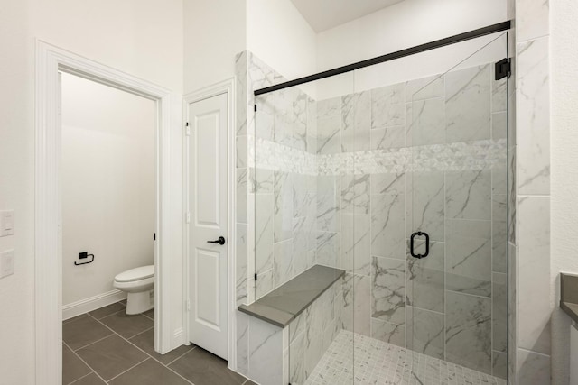 2500 Fischer Ln, Mansfield, TX 76063 - bathroom featuring an enclosed shower, tile patterned floors, and toilet