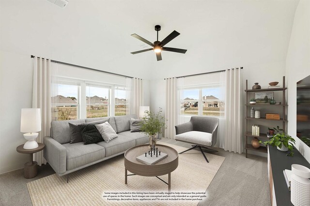 living room with light carpet and ceiling fan