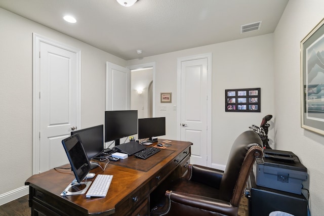 home office featuring dark hardwood / wood-style flooring