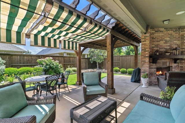 view of patio featuring an outdoor living space with a fireplace