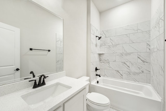 full bathroom with tiled shower / bath combo, vanity, and toilet