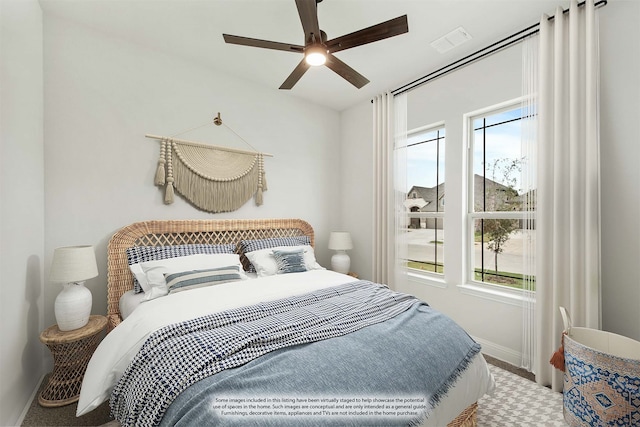 carpeted bedroom featuring ceiling fan