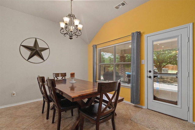 dining space with light tile patterned flooring, vaulted ceiling, and a notable chandelier