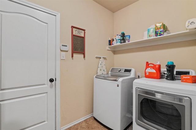 clothes washing area featuring washing machine and dryer