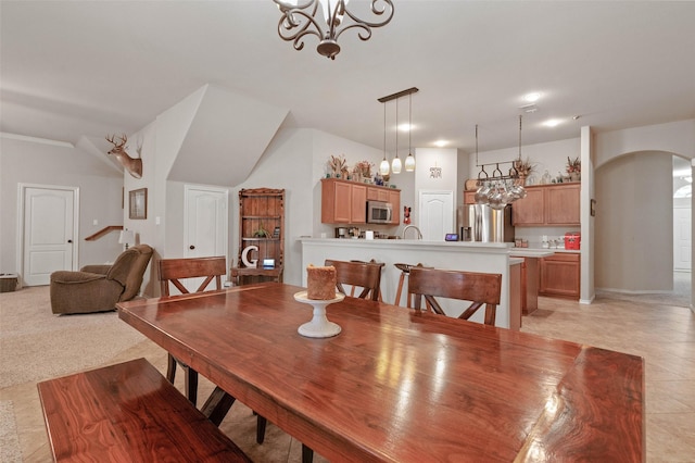 dining room featuring a notable chandelier