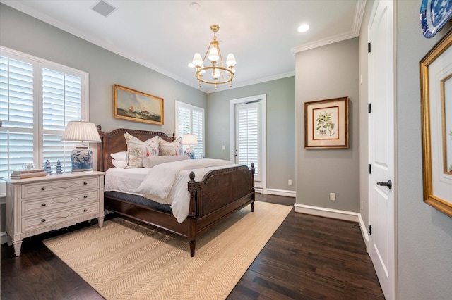 bedroom with crown molding, hardwood / wood-style floors, multiple windows, and a notable chandelier