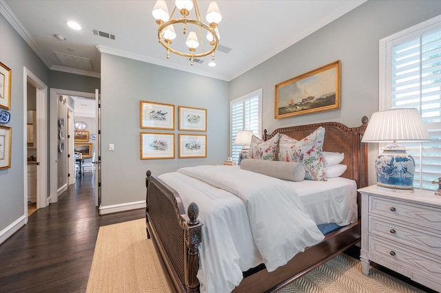 bedroom featuring a chandelier, ornamental molding, and dark wood-type flooring