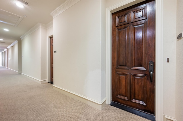 interior space with crown molding and light carpet