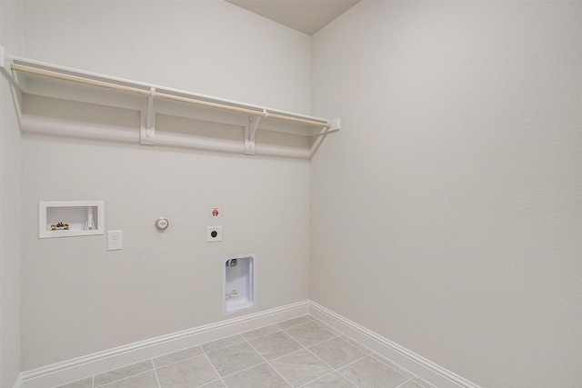 laundry room featuring washer hookup, light tile patterned floors, gas dryer hookup, and hookup for an electric dryer