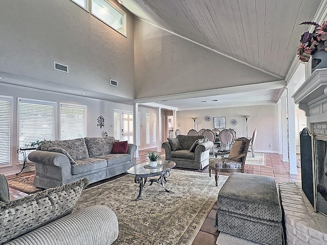 tiled living room with a fireplace, high vaulted ceiling, and wooden ceiling