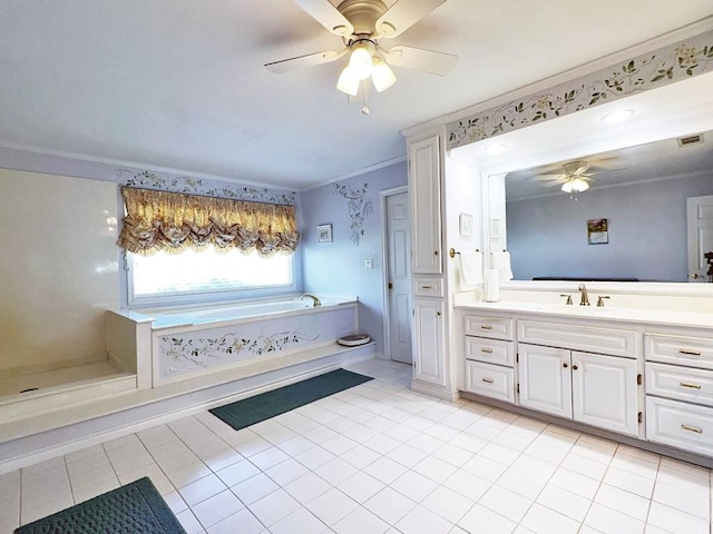 bathroom with vanity, a bath, tile patterned floors, ceiling fan, and ornamental molding