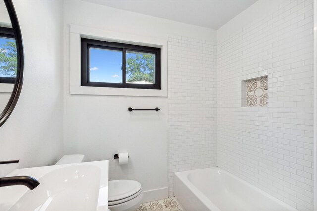 2905 Bilglade Rd, Fort Worth, TX 76133 - full bathroom with toilet, tile patterned flooring, baseboards, vanity, and shower / tub combination