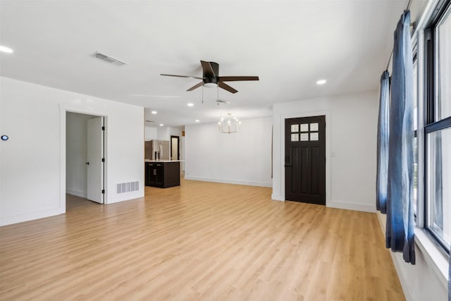 2905 Bilglade Rd, Fort Worth, TX 76133 - unfurnished living room featuring ceiling fan, healthy amount of natural light, light wood-style floors, recessed lighting, and baseboards