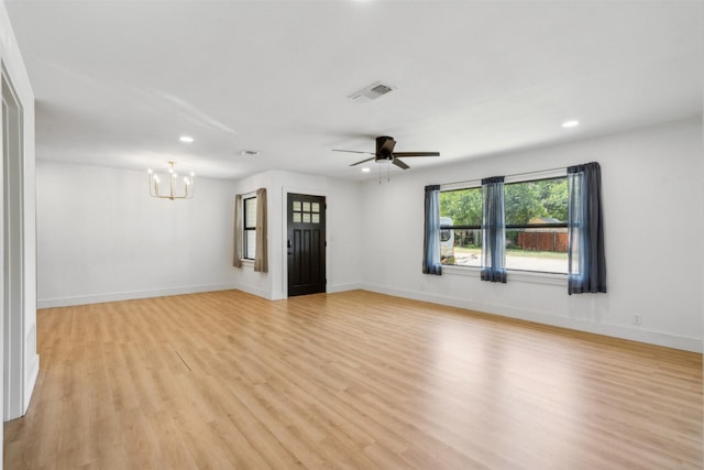 2905 Bilglade Rd, Fort Worth, TX 76133 - empty room with a chandelier, light wood finished floors, recessed lighting, a ceiling fan, and baseboards