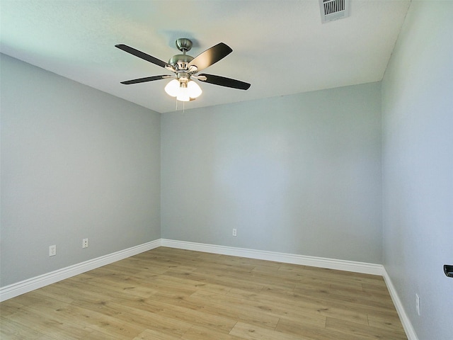 empty room featuring light wood-type flooring and ceiling fan