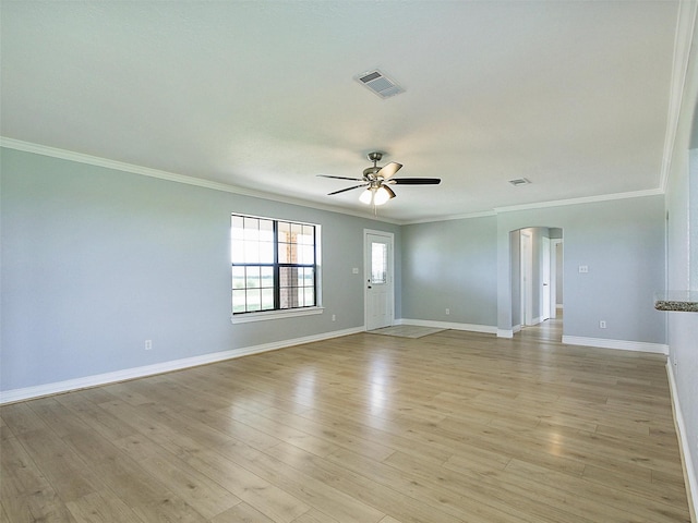 spare room with ceiling fan, light hardwood / wood-style flooring, and ornamental molding