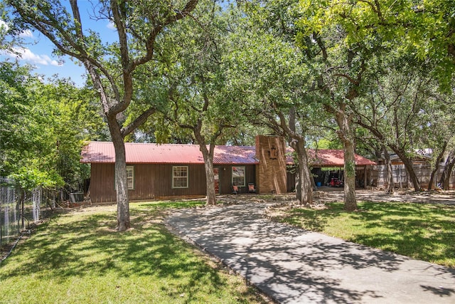 ranch-style home with a front yard