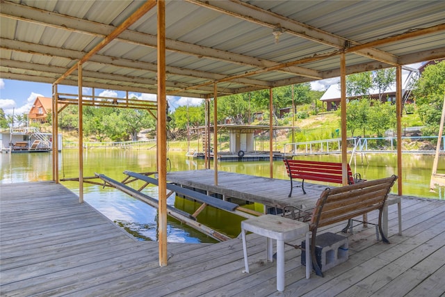 dock area featuring a water view