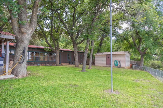 view of yard with a storage shed