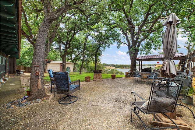 view of patio / terrace with a water view