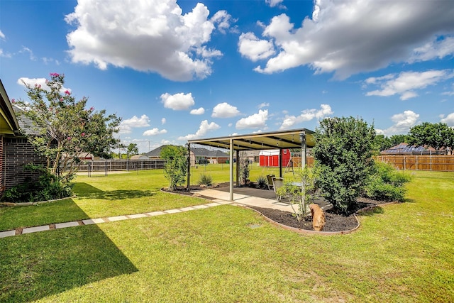 view of yard featuring a patio area and a fenced backyard