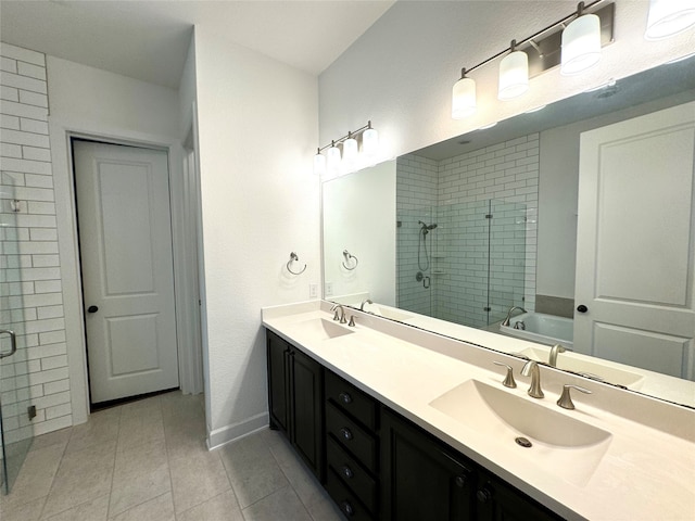 bathroom featuring tile patterned floors and double sink vanity